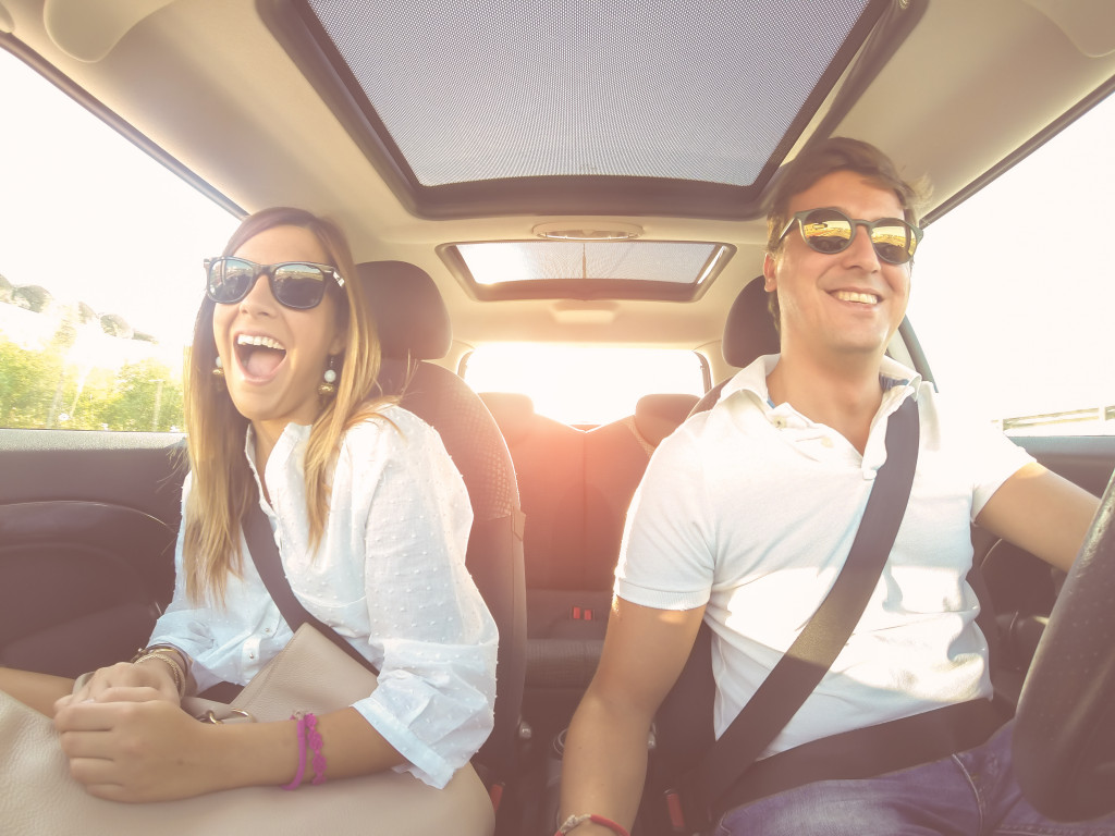 two people in car's front seat